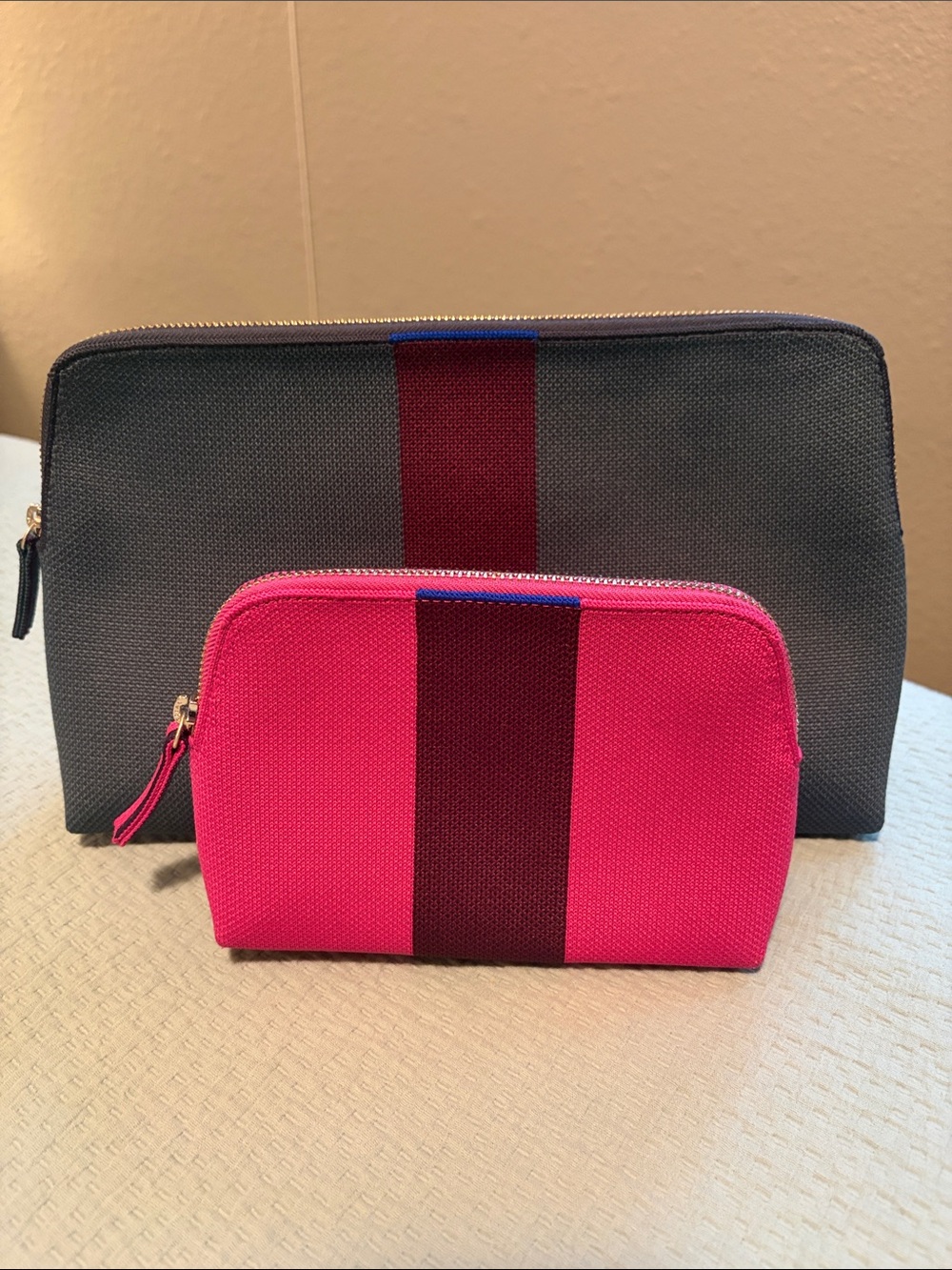 Rothy’s striped cosmetic pouches - dark green, plum & hot pink - Picture 2 of 7